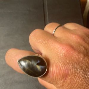 This is a beautiful Pietersite ring with amazing color depending on light/angle.